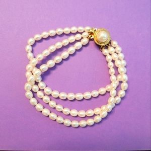 Beautiful 3 strand cultured fresh water Pearl bracelet with box clasp